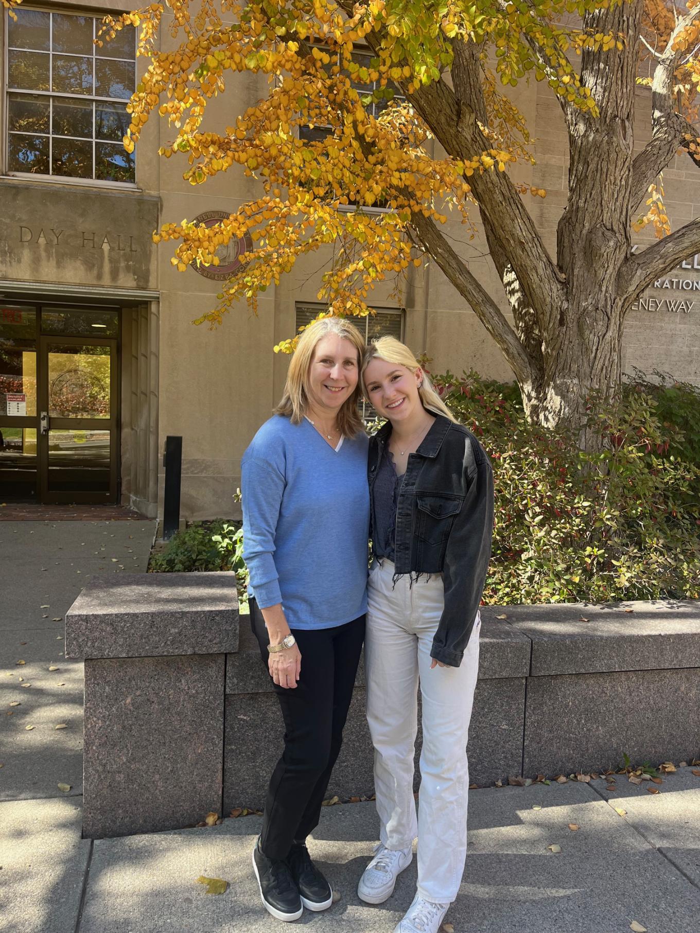Lauren Ezrol Klein ’88 with daughter, Charlotte Klein ’26 outside of Day Hall at Cornell University