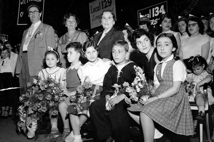 War orphans, including Jeannine Burk as a child (center), at the 1950 Golden Jubilee of the International Ladies’ Garment Workers’ Union gathering in Atlantic City.