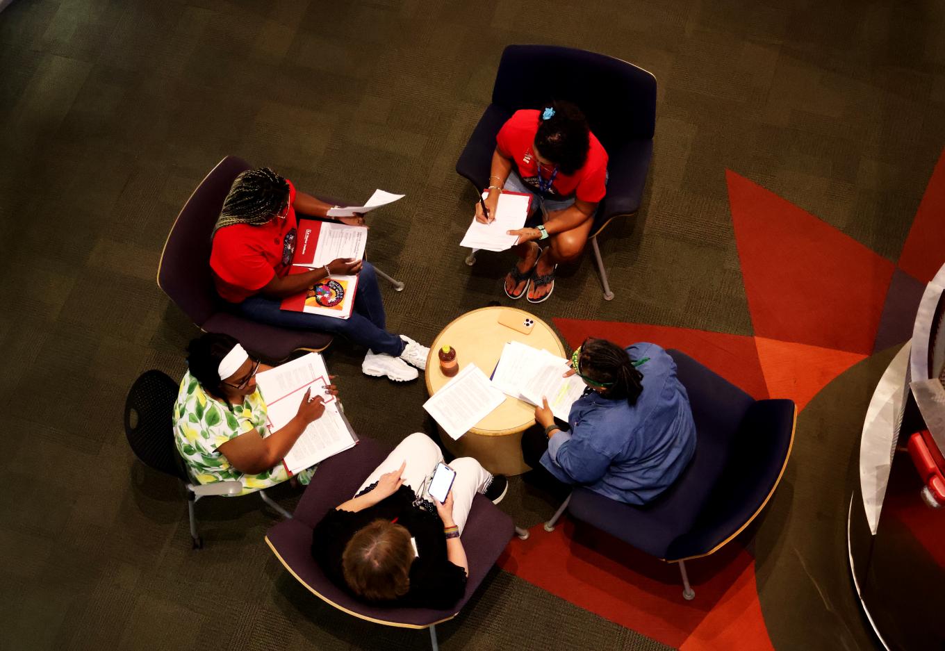 Volunteer instructors and participants prepare for their upcoming sessions.