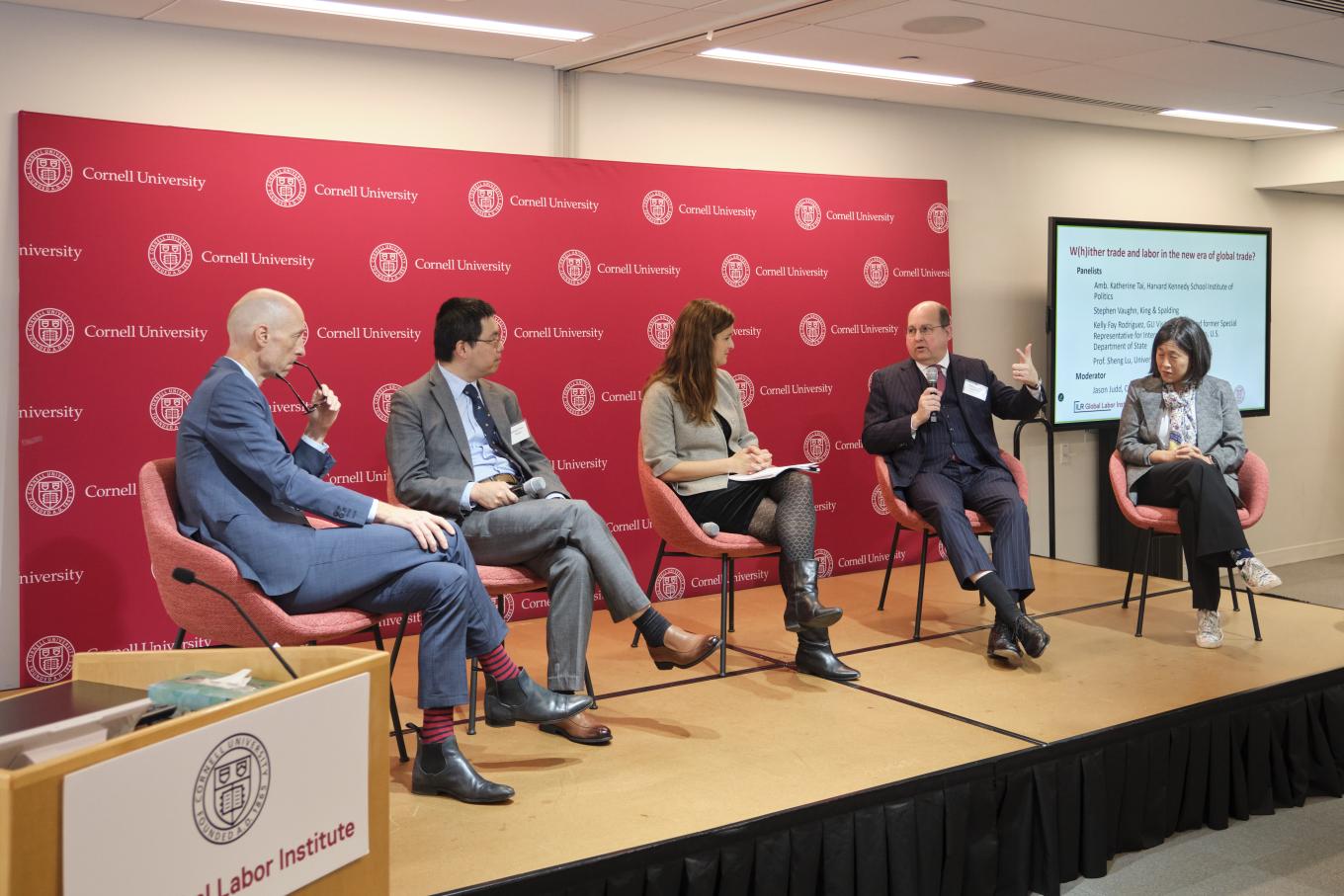 Jason Judd, Sheng Lu, Kelly Fay Rodriguez, Stephen Vaughn, and Amb. Katherine Tai take part in a panel discussion at the 2025 Global Labor Institute conference in New York City
