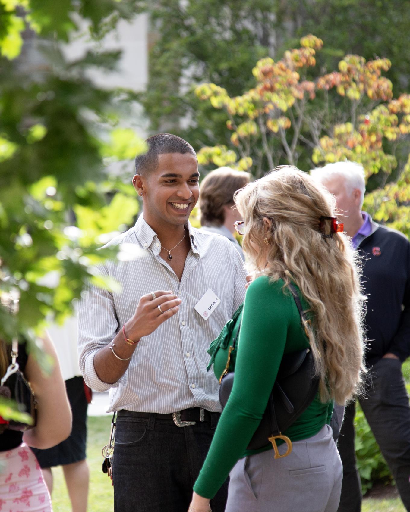 MILR students chatting at a ILR graduate programs reception