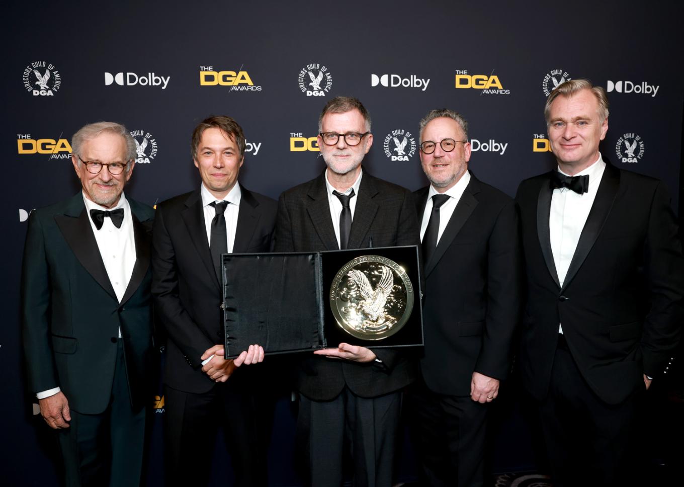 DGA Board member Steven Spielberg, presenting Director Sean Baker, 2025 DGA Outstanding Directorial Achievement in Theatrical Feature Film winner Paul Thomas Anderson, DGA National Executive Director Russell Hollander and DGA President Christopher Nolan