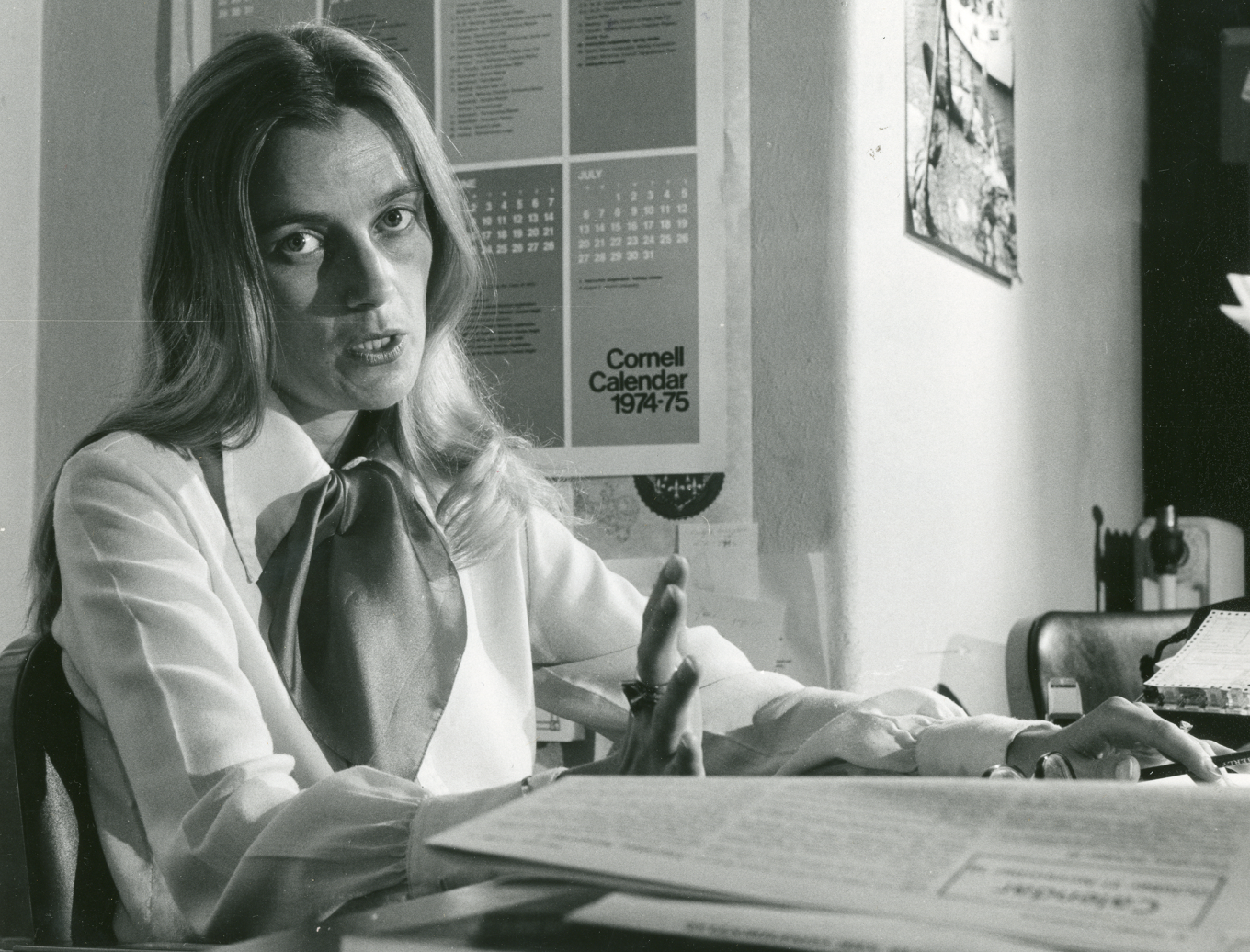 Tove Helland Hammer sitting at a desk.