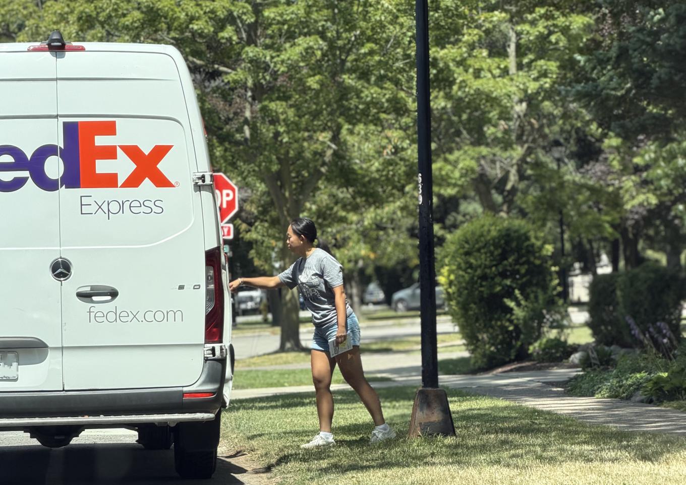 Handout survey post card to FedEx driver