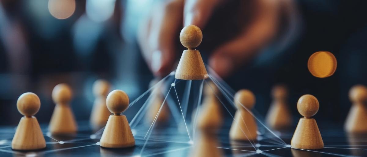 person with little figures representing talent for work