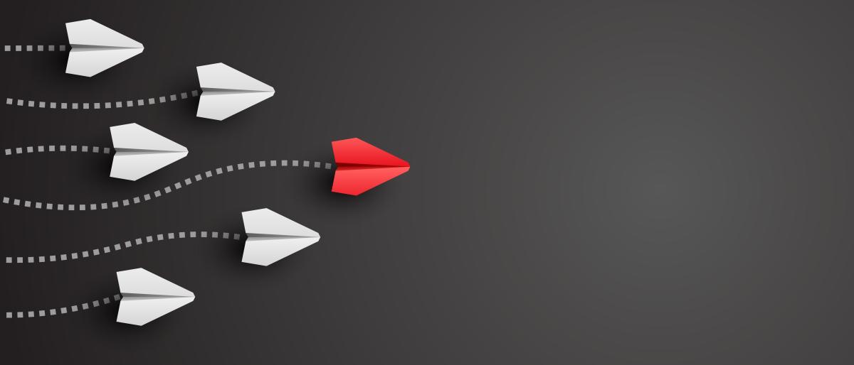 image showing red arrow in front of others leading the way