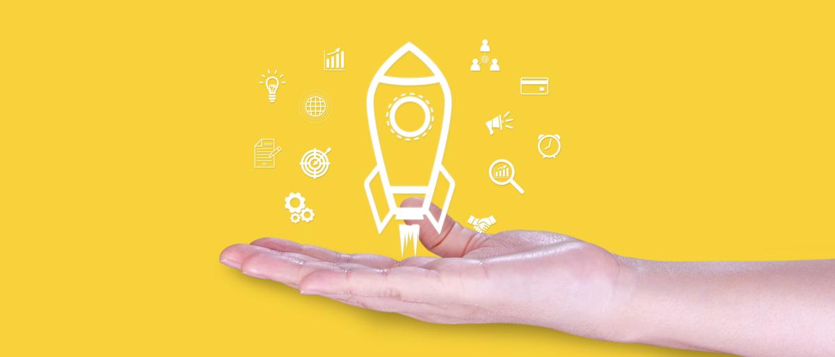 A hand supports a rocket icon surrounded by symbols representing growth, strategy, collaboration, and business development.