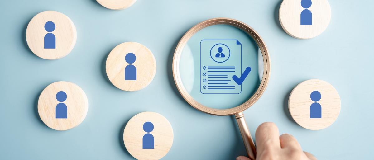 Human resource with candidate profile magnifying glass, representing recruitment, resume review, job interview, and HR hiring process.