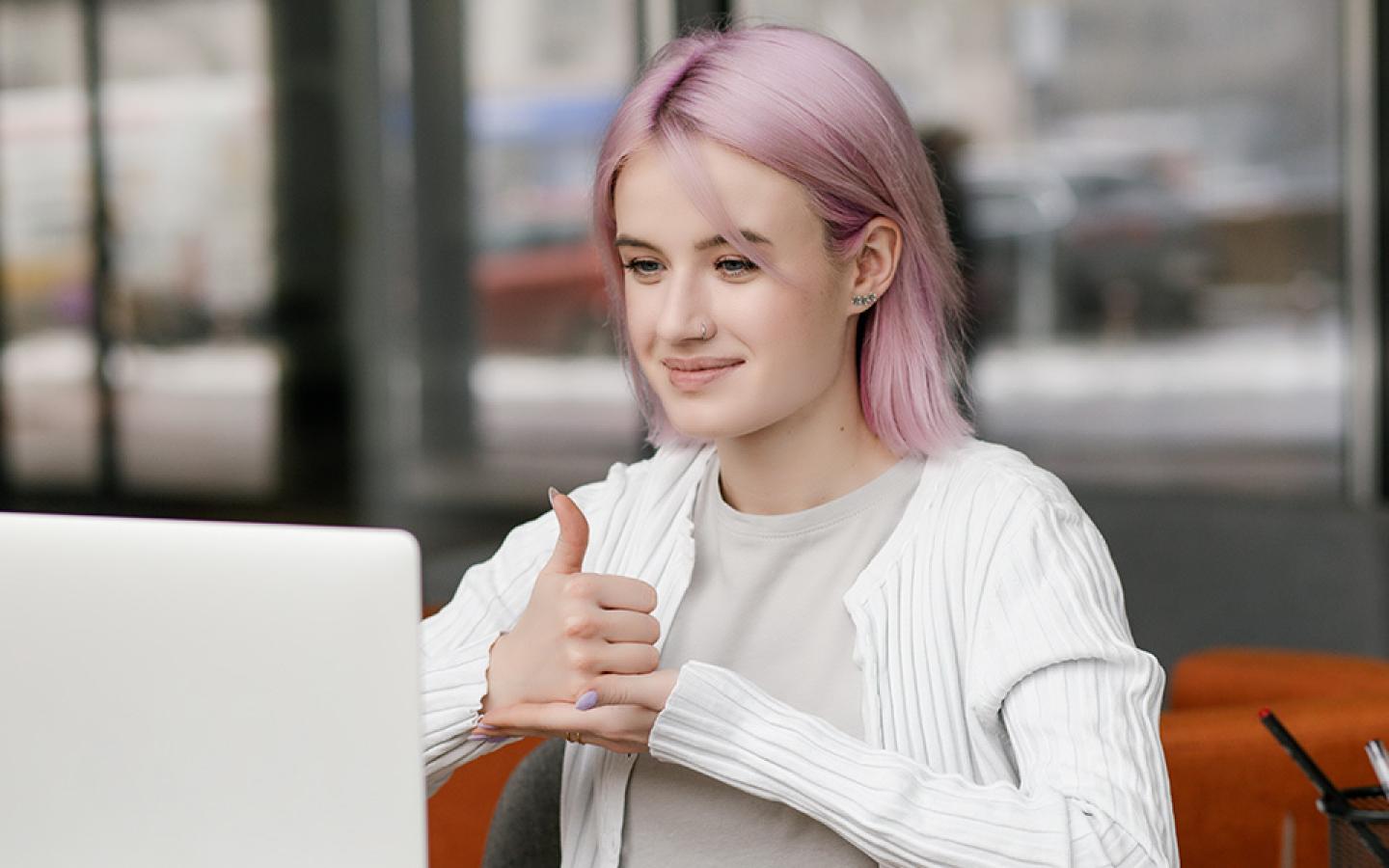 Student taking remote training on a laptop.