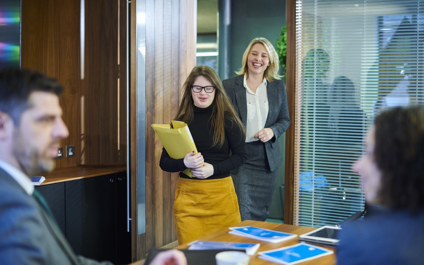 An intern entering a business office