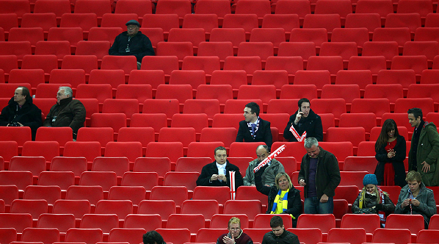 photo of mostly empty stadium seating at a sporting event