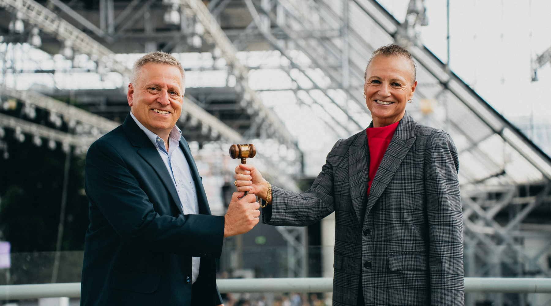 Peter Bamberger passes the gavel to new AOM President Tammy Madsen at the 85th Annual Academy of Management Conference, held in July 2025, in Copenhagen, Denmark.