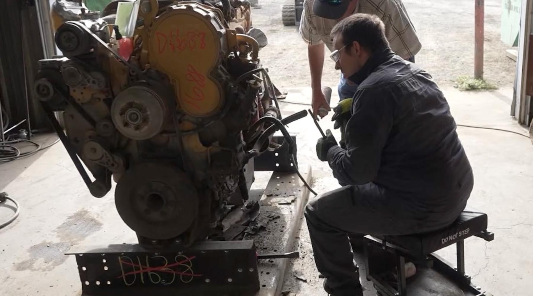 An ICAP participant repairing an engine