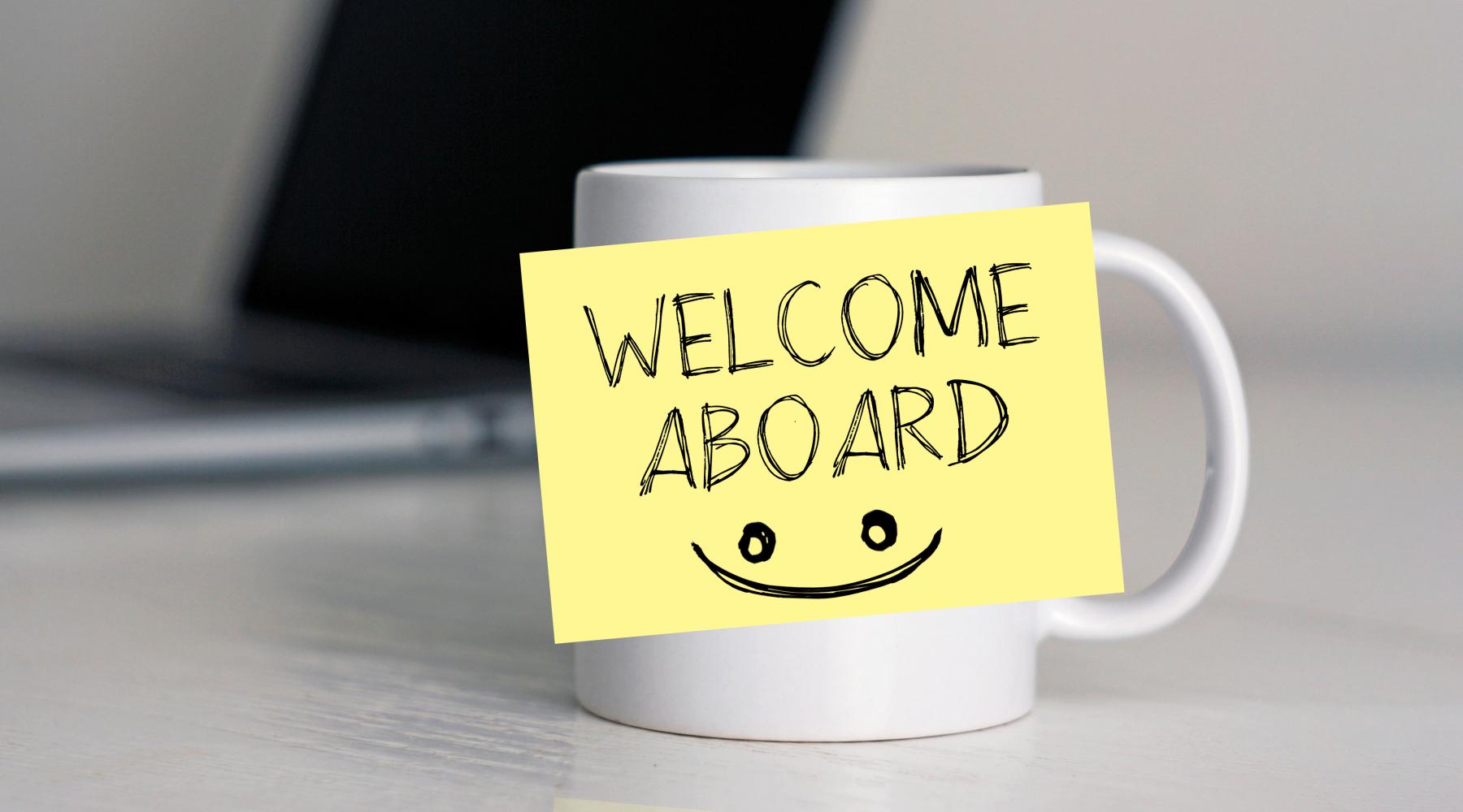 mug with sticky saying welcome aboard