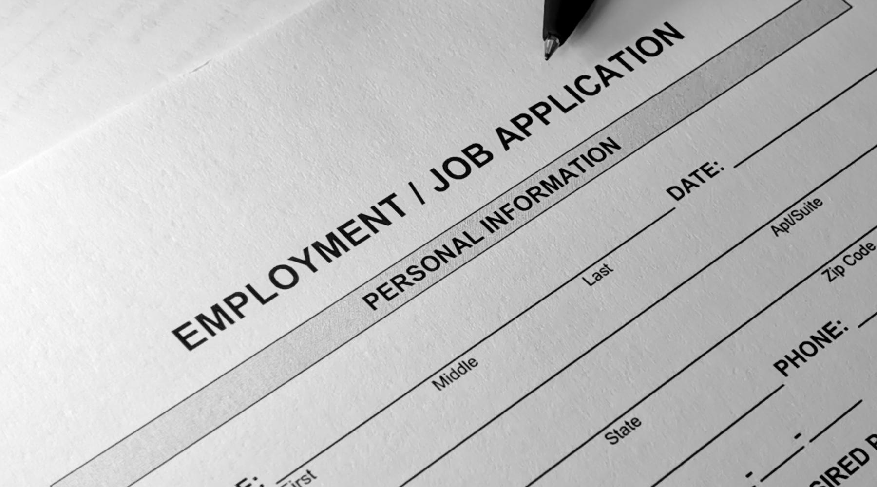 Photo of form that says "Employment/Job Application" at top