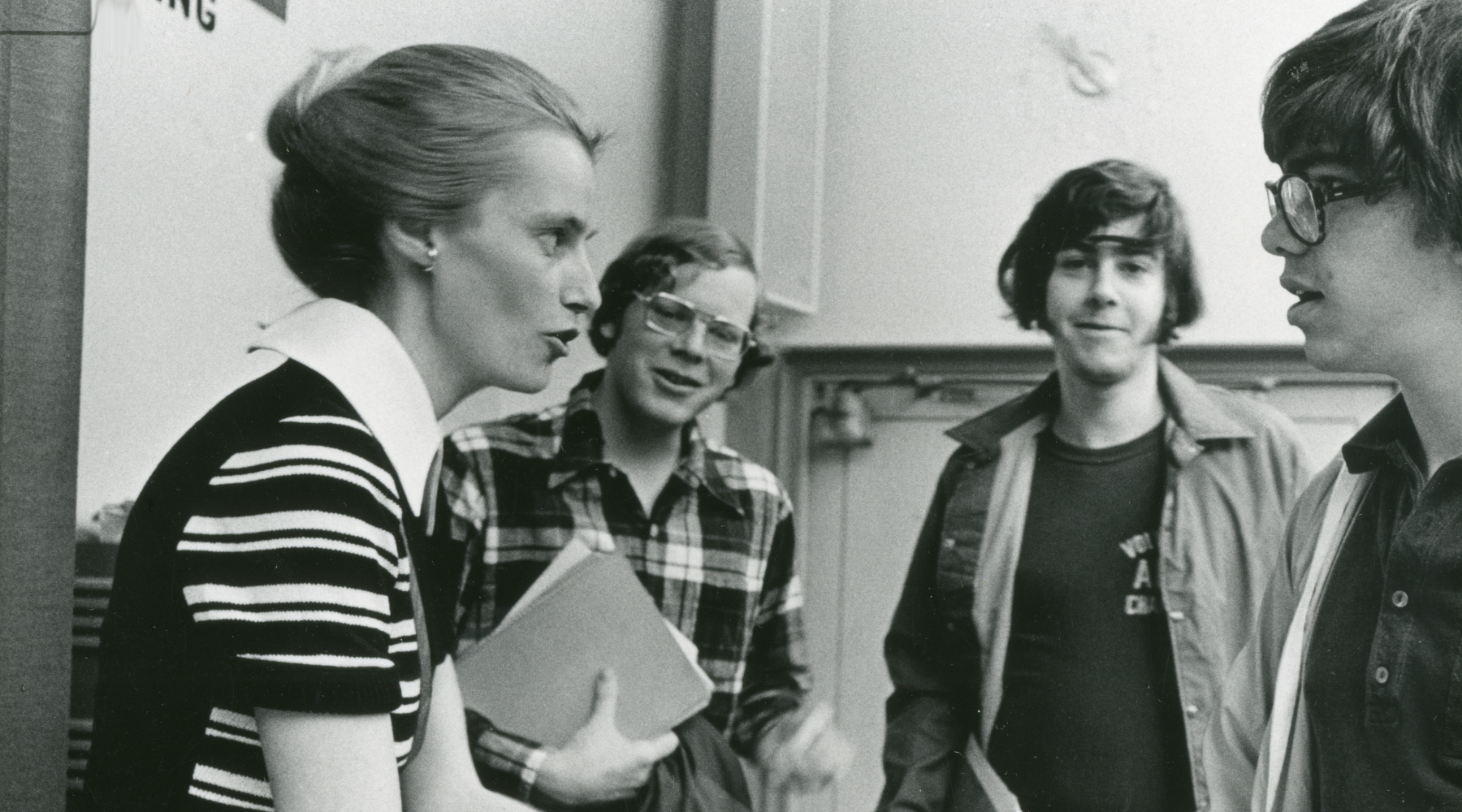 Tove Helland Hammer speaks with students in a classroom.