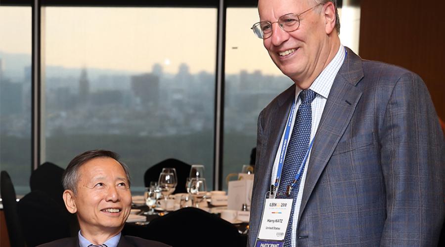 Won-Duck Lee, left, former president of the Korea Labor Institute is pictured with Harry Katz.