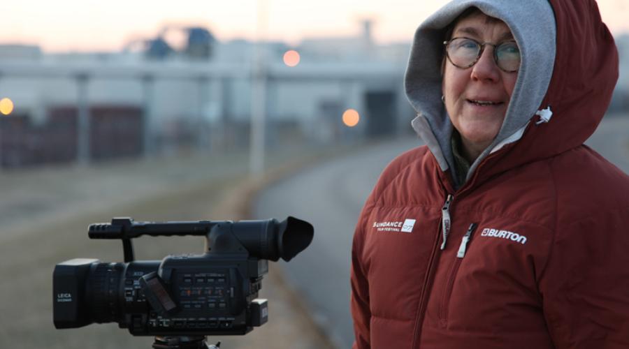 Academy Award-winning documentarian Julia Reichert filming in the cold.  