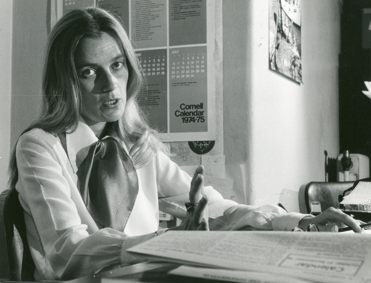 Tove Helland Hammer sitting at a desk.