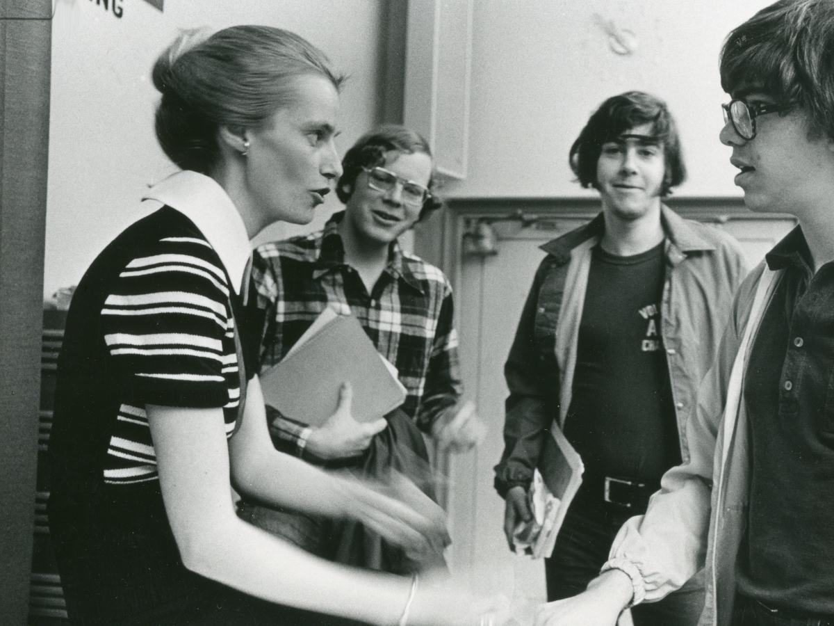 Tove Helland Hammer speaks with students in a classroom.