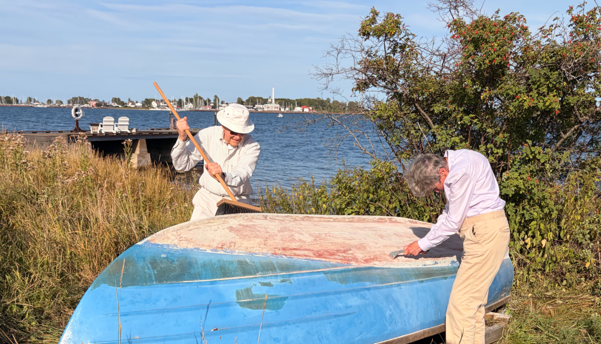 Dave and Tove Hammer working on their boat