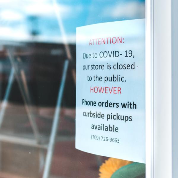 Sign on store door stating that they are closed but pickups can be scheduled.