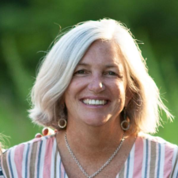 woman smiles at camera
