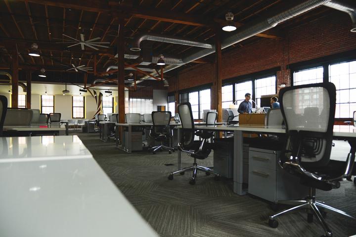 photograph of an office with chairs and desks to illustrate small business activity