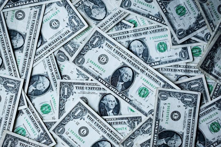 dollar bills illustrating pay