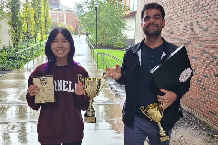 students pose with their trophies