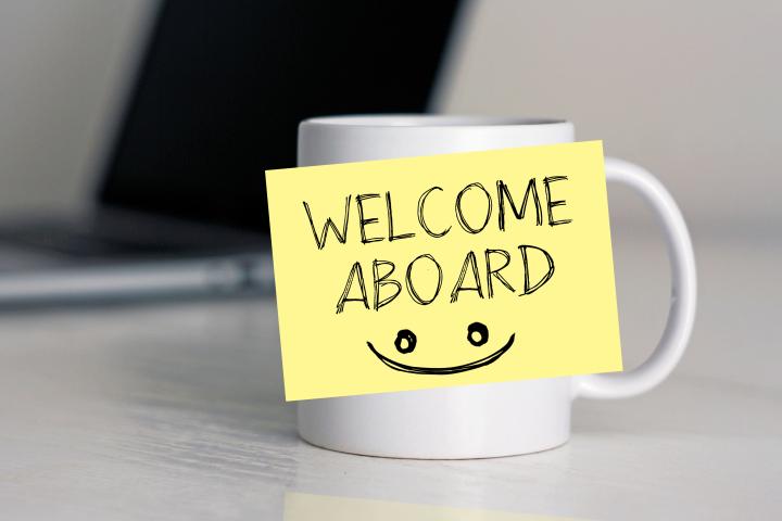 mug with sticky saying welcome aboard