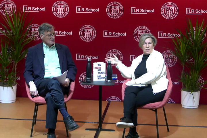 Steven Greenhouse and Randi Weingarten seated on stage