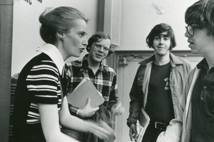 Tove Helland Hammer speaks with students in a classroom.