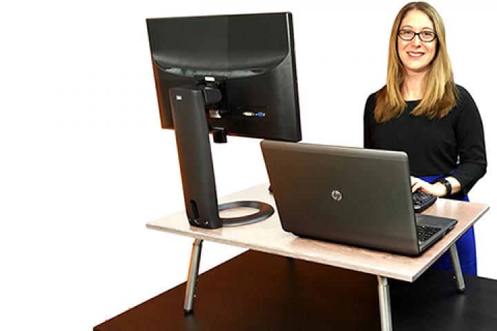 Dayna Martin and her Executive Stand Steady standing desk