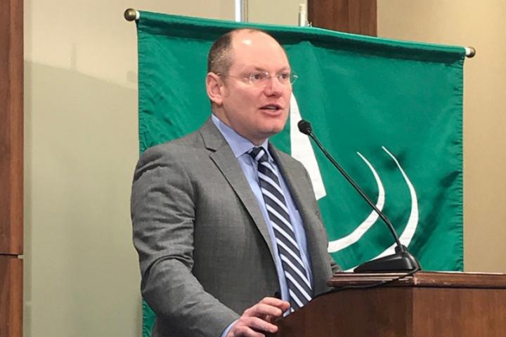 Louis Hyman, associate professor of economic history in the ILR School, speaks to policymakers at the Rayburn House Building in Washington, D.C.