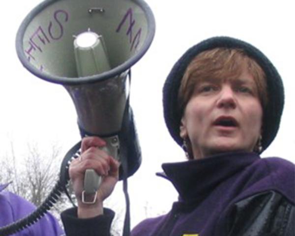 Kim Cook holding a megaphone
