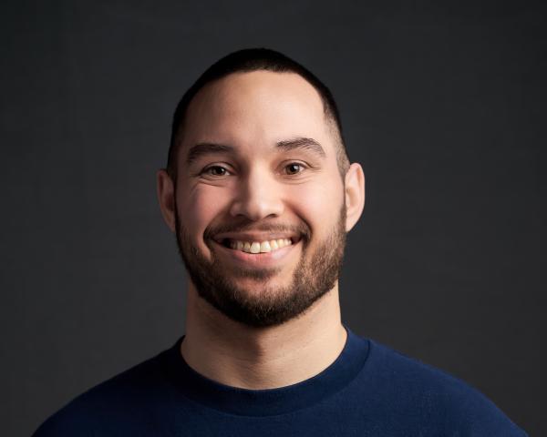 Headshot of Ian Solano-Kamaiko