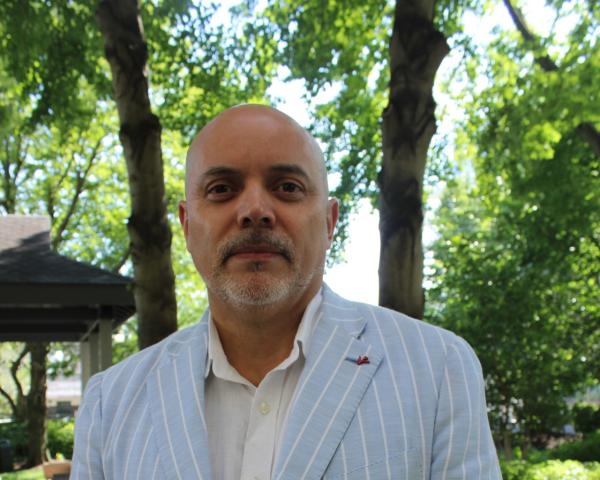 Teófilo Reyes pictured in a blue suit