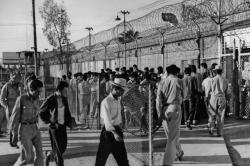 June 17, 1954: In Southern California, Mexican migrants enter El Centro border patrol compound prior to deportation. (Larry Sharkey / Los Angeles Times Archive / UCLA)
