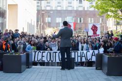 Mayor Svante Myrick speaks at rally for JosÃ© Guzman-Lopez, who was remanded to U.S. Marshalsâ€™ custody on Friday. Hundreds protested his arrest by ICE agents earlier this month in Ithaca. Protestors hold banner reading "ICE OUT OF ITHACA" [Cameron Pollack]